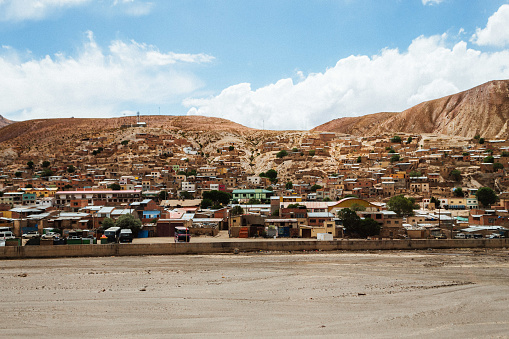 Atocha town among desert terrain in Altiplano, Bolivia