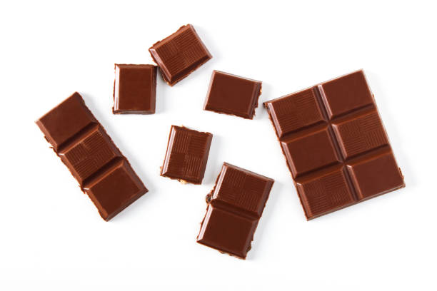 кусочки шоколада - chocolate стоковые фото и изображения