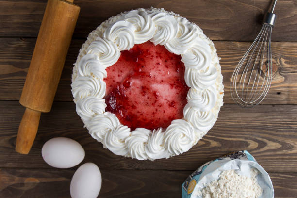 istock Strawberry cake on a wooden background 1249855300