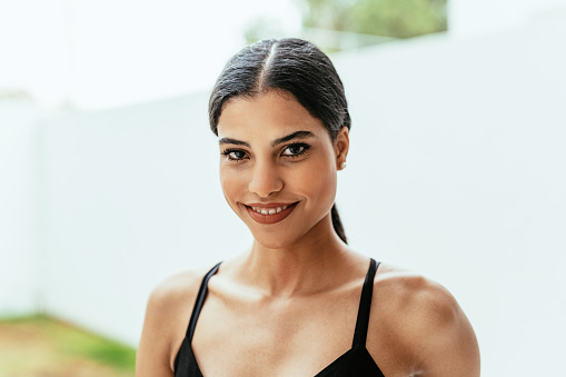 Headshot of beautiful Latina young woman