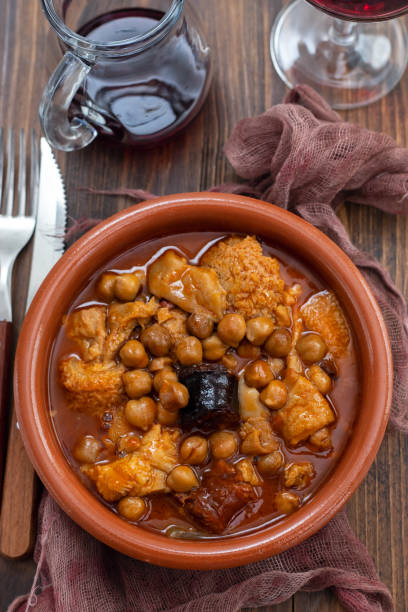istock spanish dish callos, beef tripe stew with chickpeas, morcilla and chorizo in ceramic bowl 1249862402