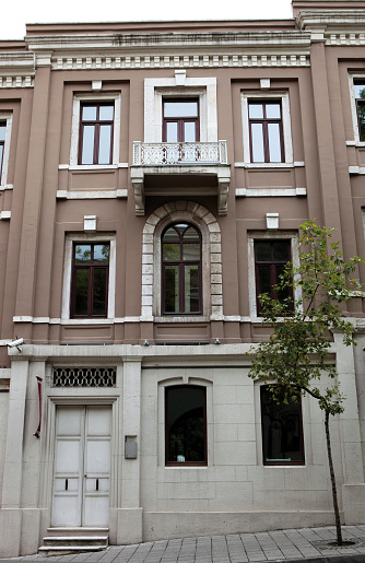 Istanbul, Besiktas / Turkey – August 12, 2011: Akaretler Street (Akaretler Caddesi) is the popular district of Besiktas. Famous for the Row Houses, built in 1875 for the accommodation of the Ottoman palace staff. Istanbul, historical buildings and tourism concepts.