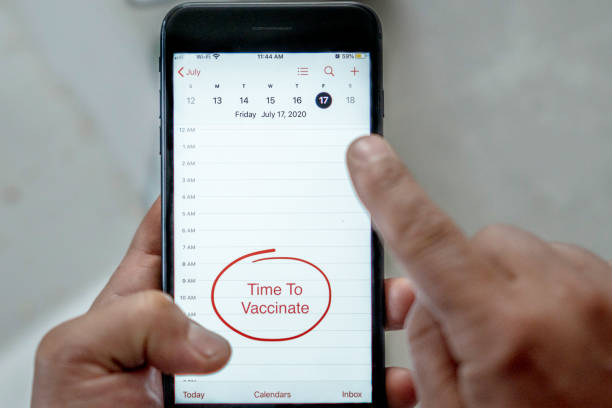 istock Time to Vaccinate appointment on smart phone 1249866094