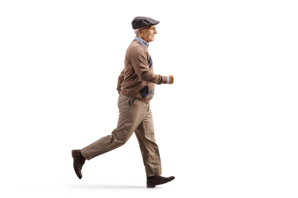 istock Elderly man in casual clothes running 1249866273