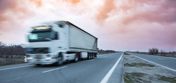 istock truck on road 1249867374
