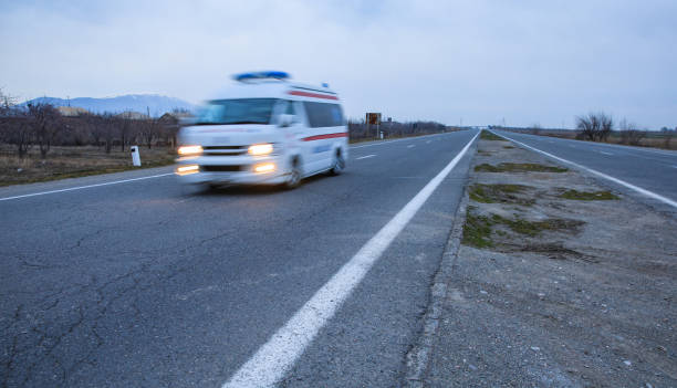istock ambulance truck in road 1249868477