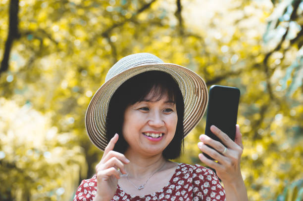 istock Pretty woman in garden 1249869457