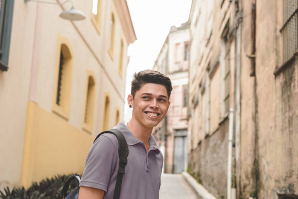istock Portrait of smiling young man 1249870700