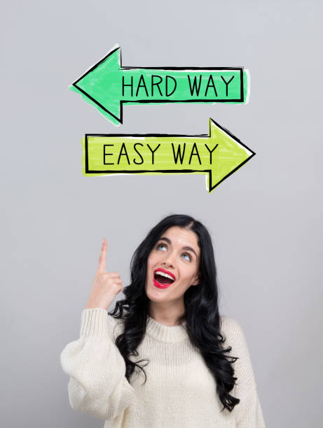 istock Hard way or easy way with happy young woman 1249876087