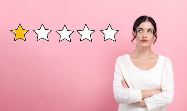 istock One star rating with young woman 1249876102