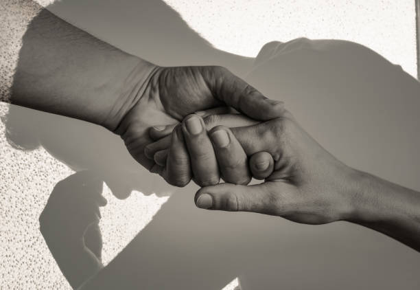 istock Young man in need of a helping hand. Multiple exposure. 1249878861