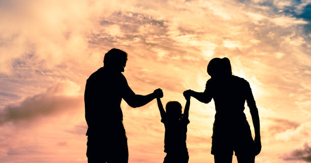 istock Family playing at sunset. 1249879091