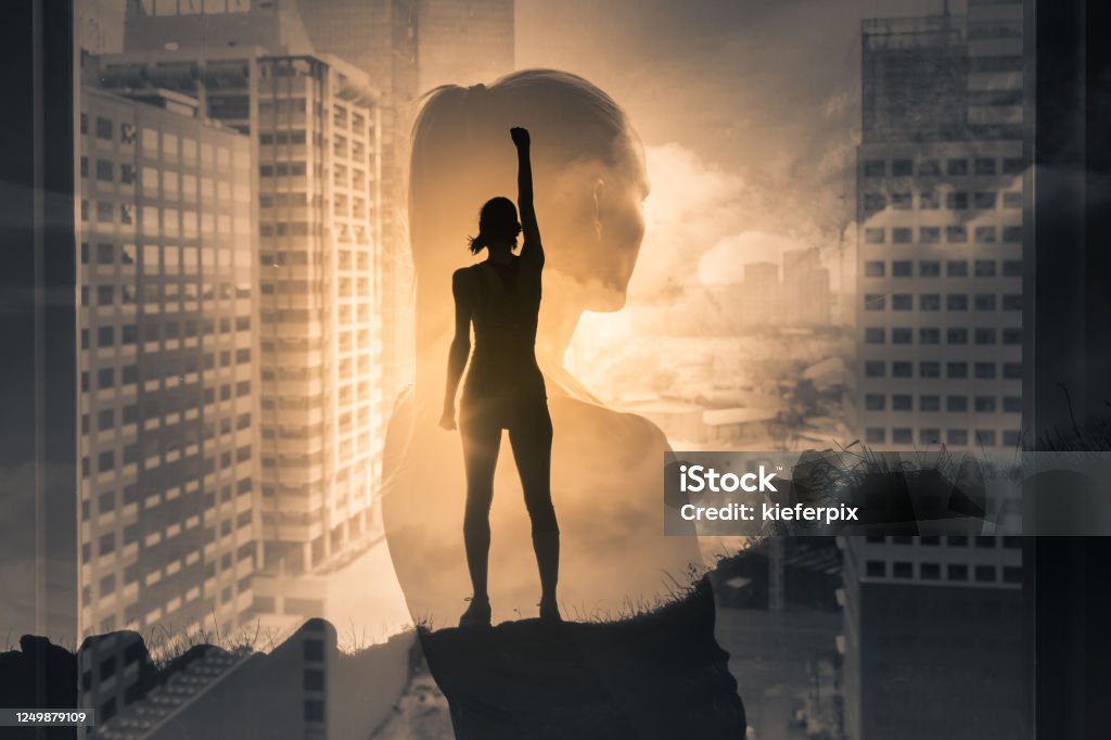 Silhouette of super strong successful businesswoman. Mental strength, determination, and people power, positive thinking concept. double exposure. Women Stock Photo