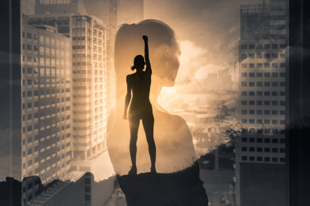 Silhouette of super strong successful businesswoman. Mental strength, determination, and people power, positive thinking concept. double exposure. superhero photos stock pictures, royalty-free photos & images