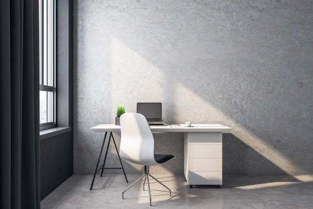 istock Home office desk with laptop 1249879256