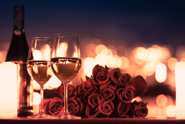 istock Candlelight dinner and beautiful city lights view. 1249880418
