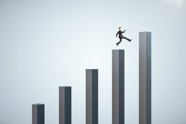 istock Businessman jumping on stock chart 1249880578