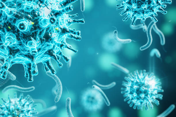 istock Microscopic view of blue virus cells 2019-nCov. 1249880880