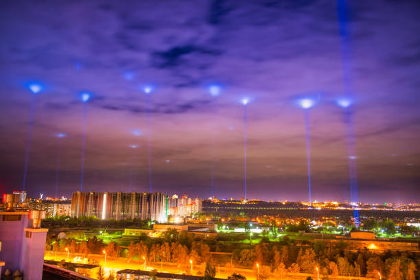 istock Night illuminated city with blue lights 1249882337