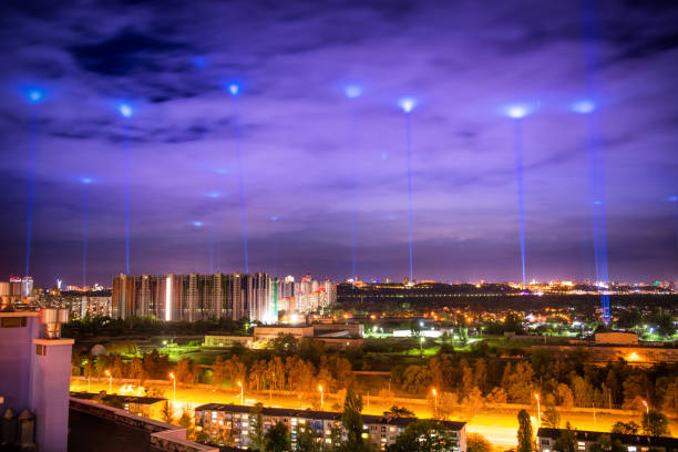 istock Night illuminated city with blue lights 1249882359