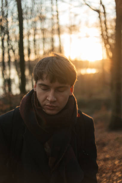 istock Portrait of a young man walking in sunset 1249883577
