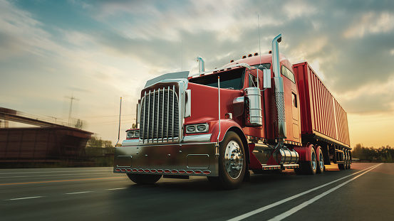 The Truck Runs On The Highway With Speed Stock Photo - Download Image Now -  Semi-Truck, Truck, Trucking - iStock