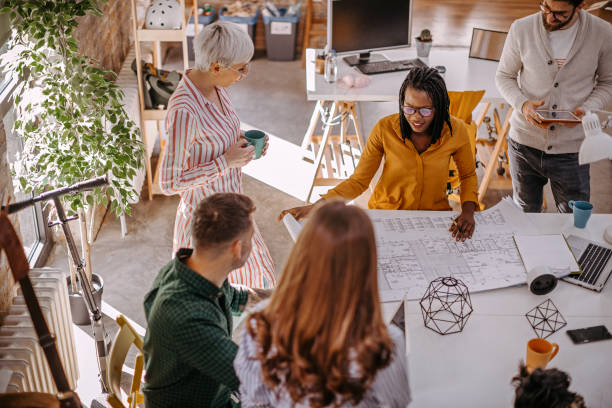 istock Multi-ethnic group of people in a discussion 1249889626