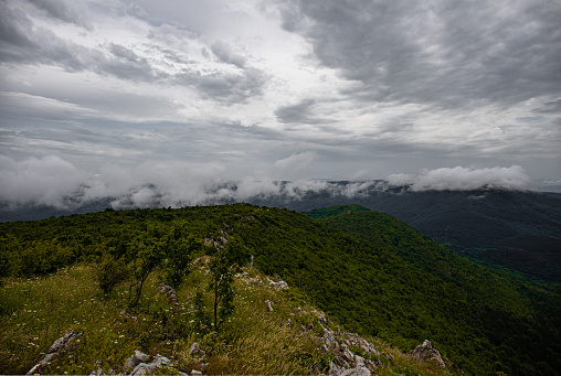 A cloudy mountain peak of the Homolje mountains in eastern Serbia.