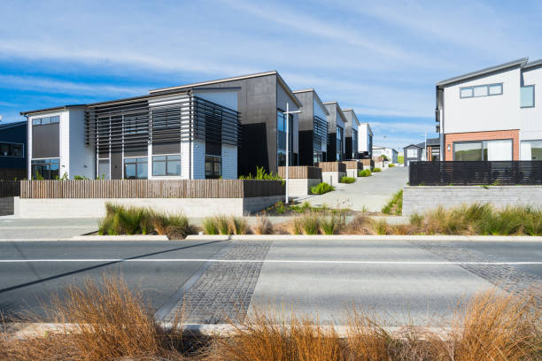istock Houses next to road. 1249898420