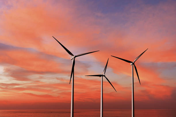 istock Wind turbines as alternative renewable energy on a background sunset sky. 1249902479