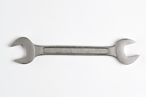 Top View of Stainless Steel Wrench with Real Shadow. Copy Space for Text or Image