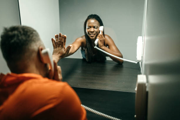 istock Wife in visit to husband in prison 1249907877