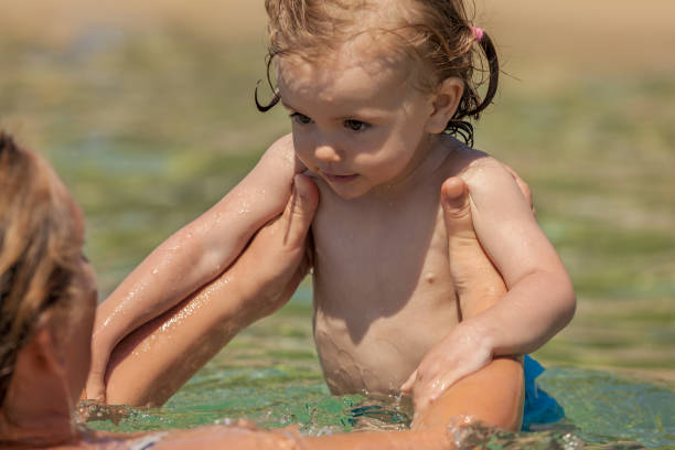 istock child in the sea 1249909858