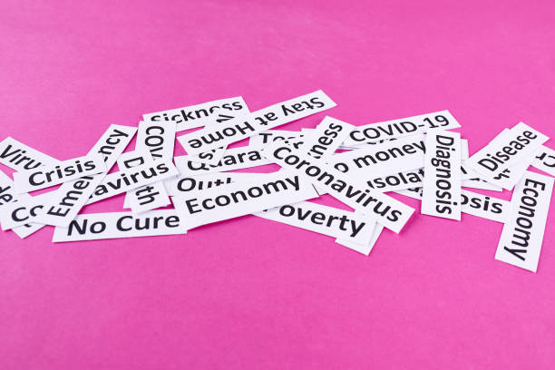 istock Coronavirus, pandemic headline clipping words on pink background 1249909876