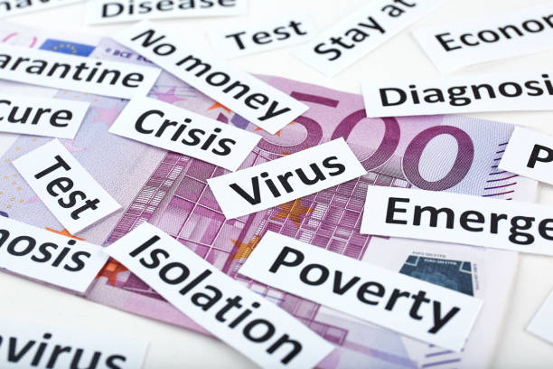istock Coronavirus, COVID-19 headline clippings on 500 Euro banknote 1249909921