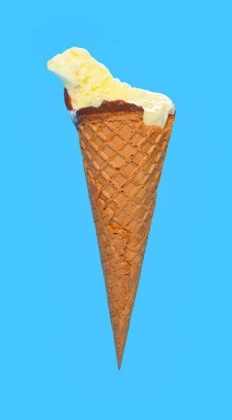 istock side view fresh pineapple ice cream cone with couple of bites on blue background 1249909986
