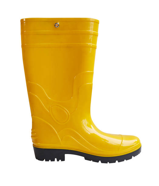 istock Yellow rubber boots isolated on white 1249913340