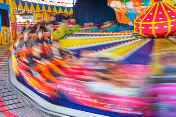 istock amusement ride in theme park 1249923416