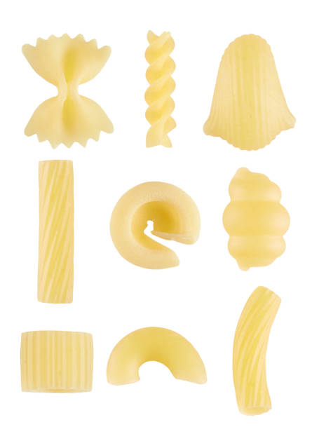 типы макаронных изделий - pasta directly above fusilli food стоковые фото и изображения