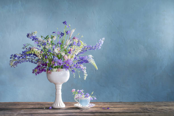 istock summer bouquet in blue and violet colors on dark background 1249947608