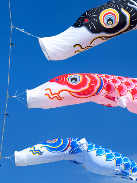 istock Carp streamer flying in the blue sky 1249948850