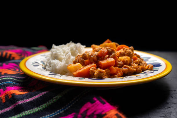 istock Mexican picadillo with rice on dark background 1249949851