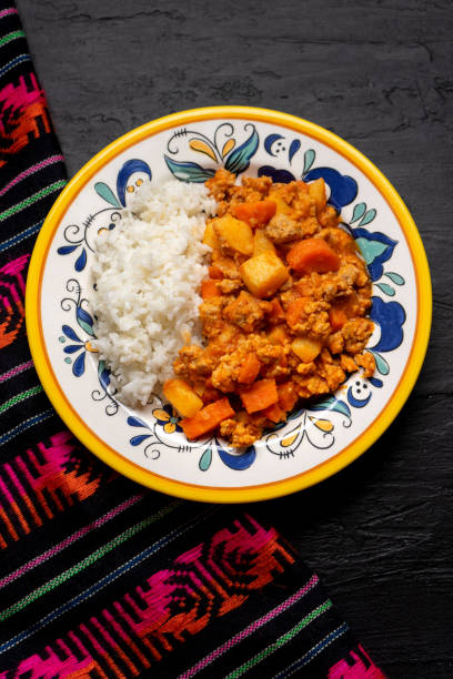 istock Mexican picadillo with rice on dark background 1249949933