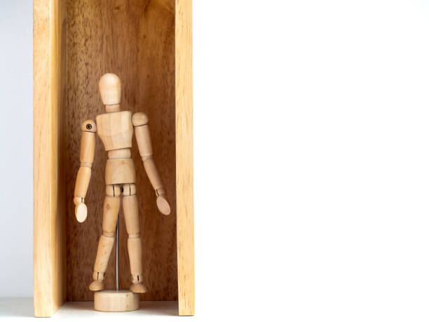 istock New Normal, wooden figure in the box. 1249953888