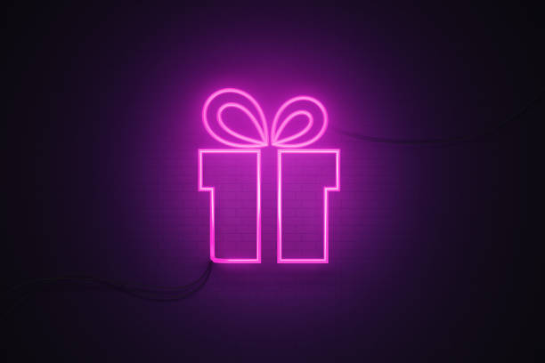 Gift Box Drawn by Purple Neon Light on Black Wall