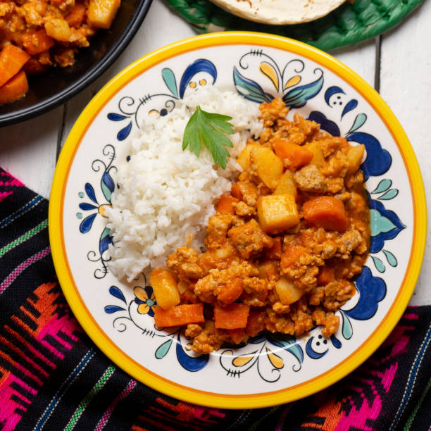 istock Mexican picadillo with rice on white background 1249955709