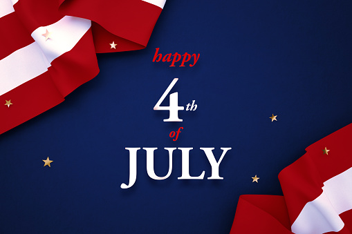 Happy 4th of July message over American flag and star shaped confetti sitting on navy blue background. Horizontal composition with copy space. Directly above.