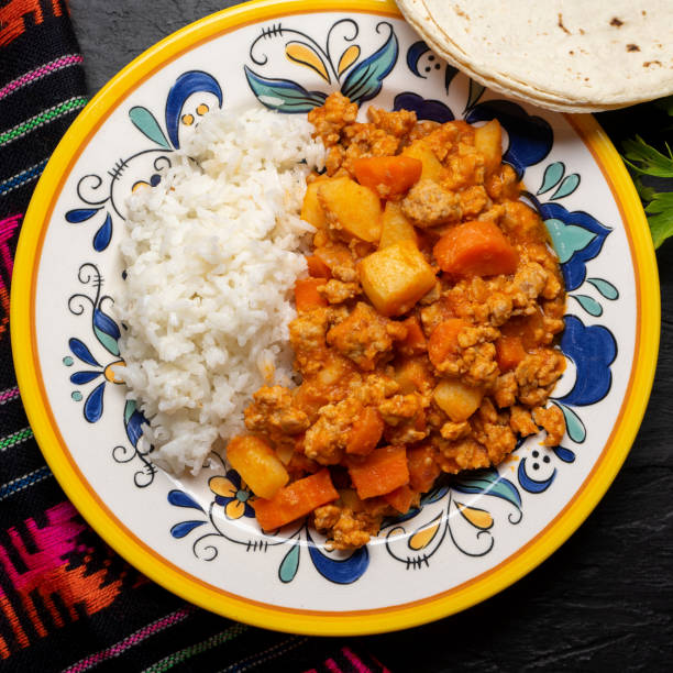 istock Mexican picadillo with rice on dark background 1249957402