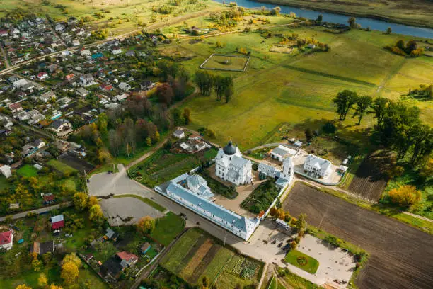 Photo of Mahiliou, Belarus. Mogilev Cityscape With Famous Landmarks - Church of Saints Boris and Gleb, and Church of the Exaltation of Holy Cross. Aerial View Of Skyline In Autumn Day. Bird's-eye View