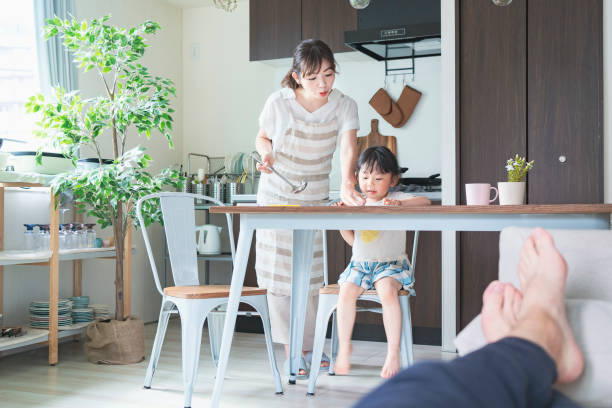 istock A girl drawing in the kitchen 1249961266
